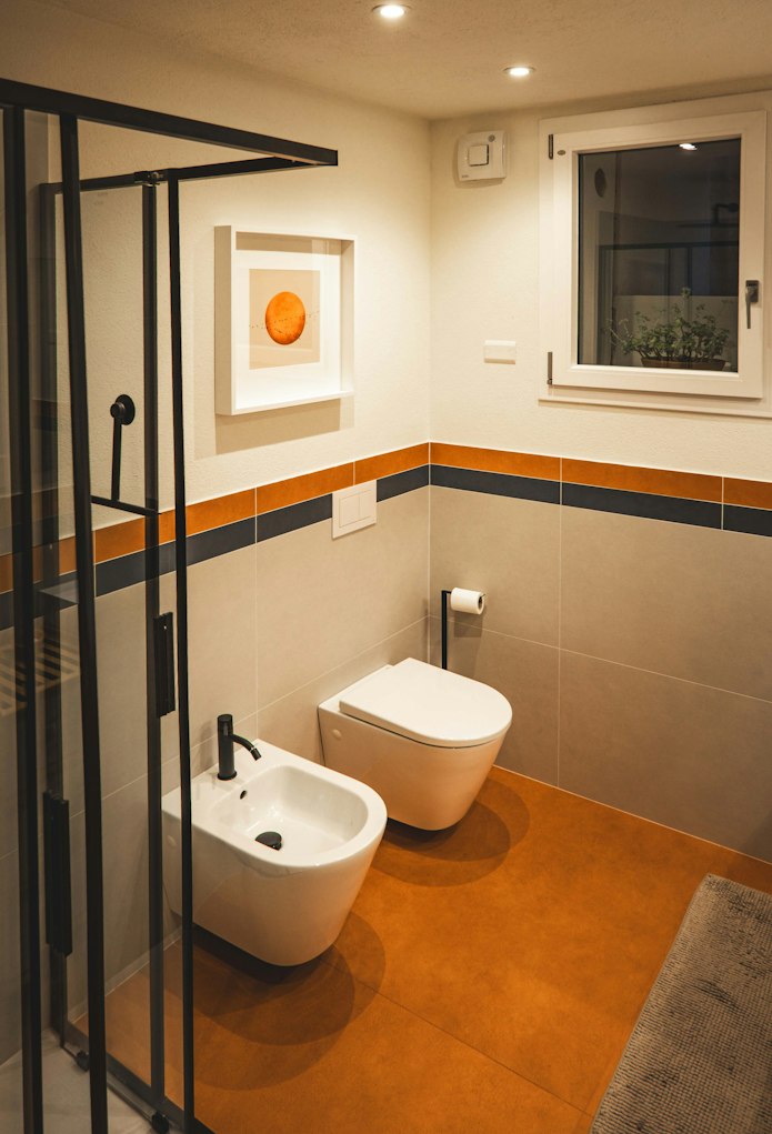 Contemporary toilet and bidet in a bathroom